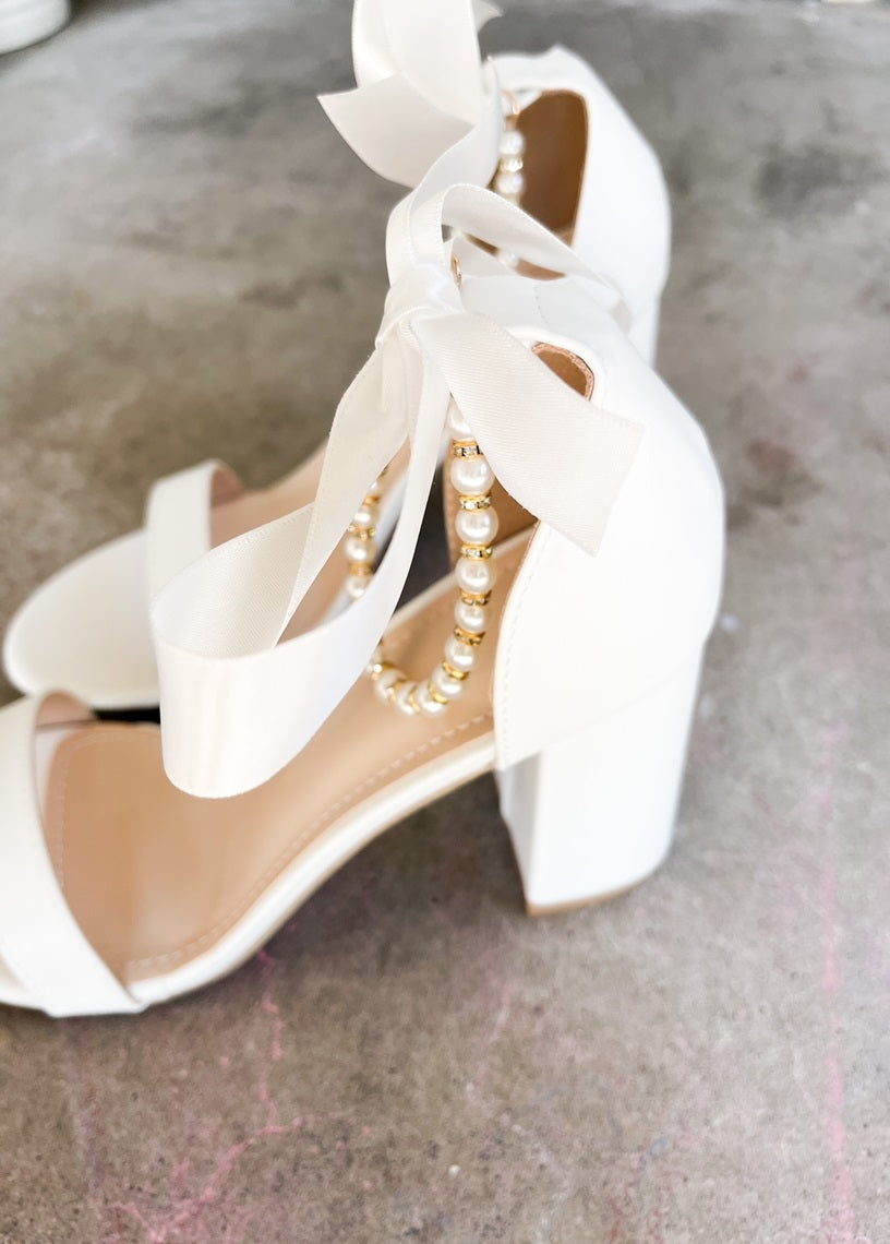 Trish Pearl Ankle Strap Bow Heels in White
