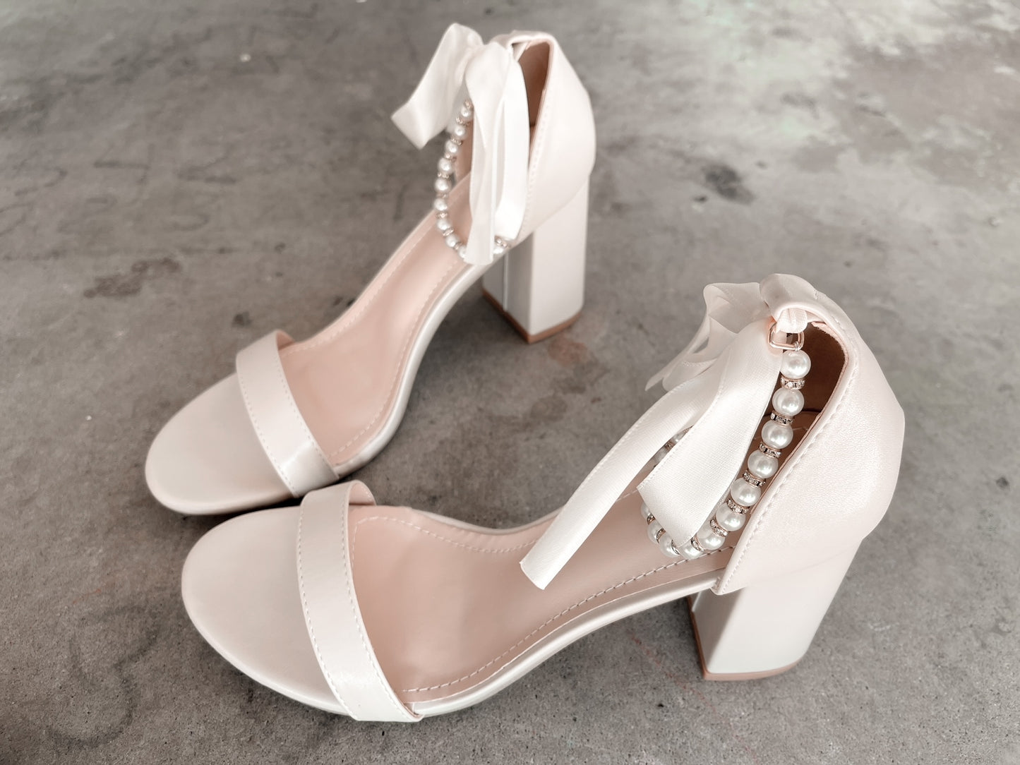Trish Pearl Ankle Strap Bow Heels in Sand