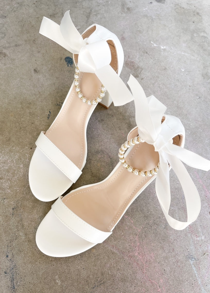 Trish Pearl Ankle Strap Bow Heels in White